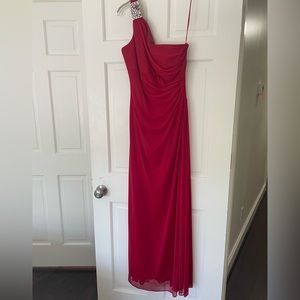Red one shoulder gown